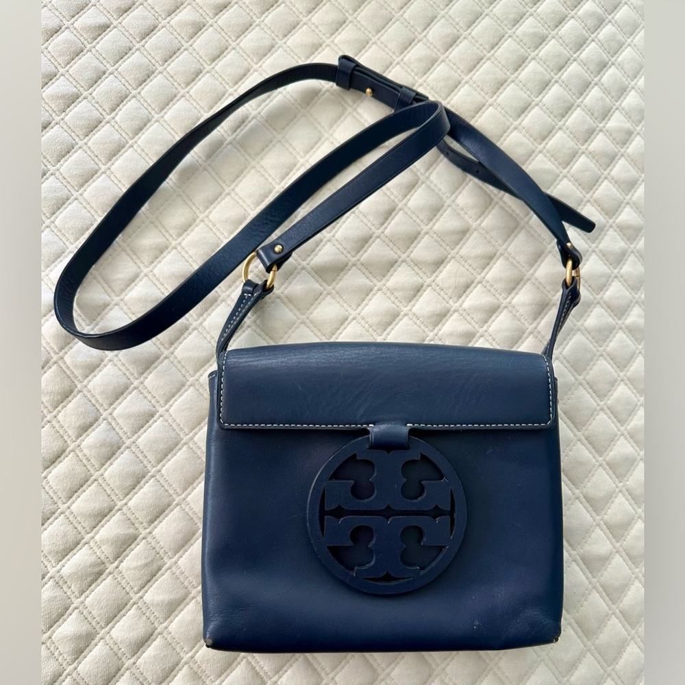 Tory Burch Navy purse with shoulder strap.  In good condition.